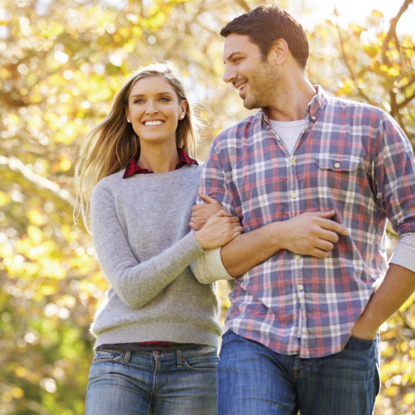 Couple walking along a nature trail.