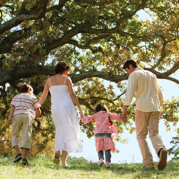 Family walking along a nature trail.